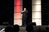 Brian Burchfield singing on stage