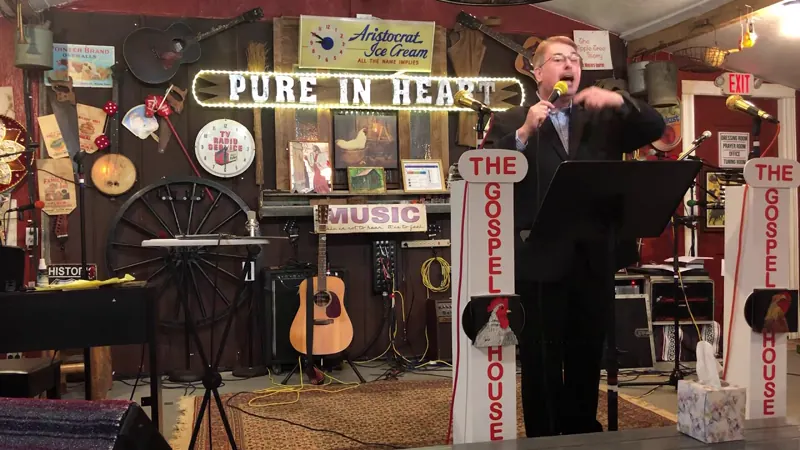 Brian Burchfield singing at The Gospel Chicken House